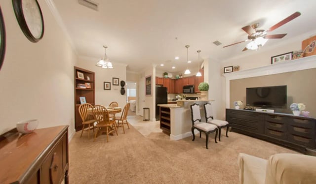 Dining table kitchen and living room area at Ashton Lane Luxury Apartments in Gainesville Student Accommodation