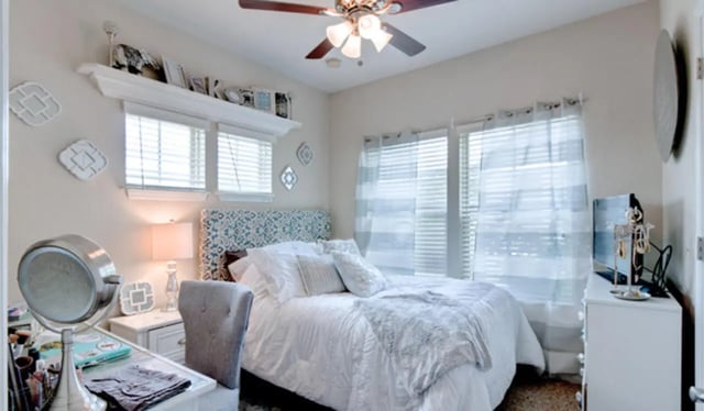 Bed makeup vanity and dresser bedroom interior at Ashton Lane Luxury Apartments in Gainesville Student Accommodation