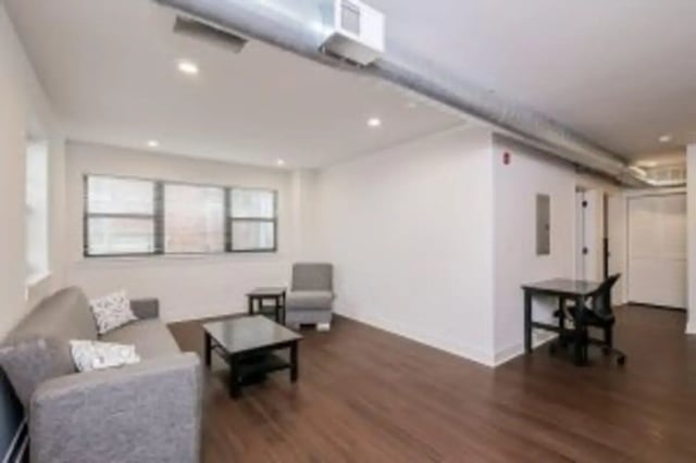 Sofa coffee tables chair study desk living room at Cooper Village in Camden Student Accommodation