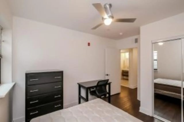 Black dresser desk chair open door bedroom at Cooper Village in Camden Student Accommodation