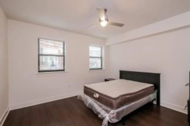 Bed mattress ceiling fan two windows bedroom at Cooper Village in Camden Student Accommodation