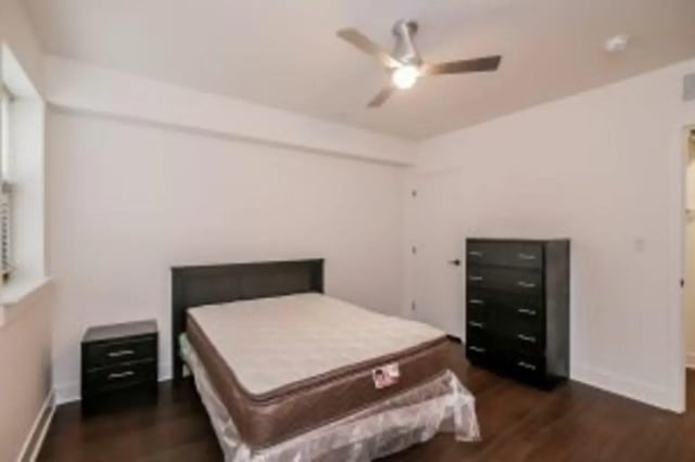 Bed dresser nightstand ceiling fan bedroom at Cooper Village in Camden Student Accommodation