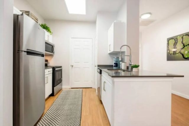 Stainless steel refrigerator stove sink kitchen at The Pointe State College in State College Student Accommodation