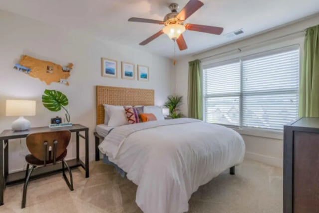 Bed desk chair lamp and ceiling fan bedroom at Brexx at Blacksburg in Blacksburg Student Accommodation