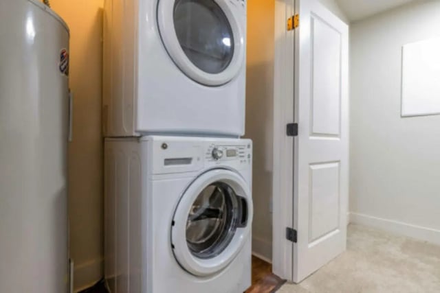 Stacked washer dryer and water heater utility area at Brexx at Blacksburg in Blacksburg Student Accommodation