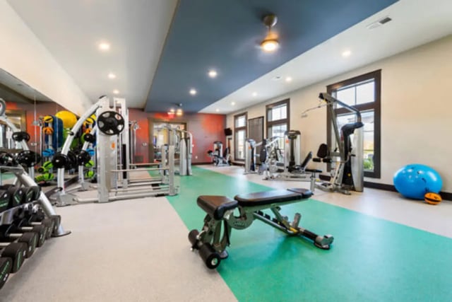 Weight machines dumbbells and exercise bench gym at Brexx at Blacksburg in Blacksburg Student Accommodation