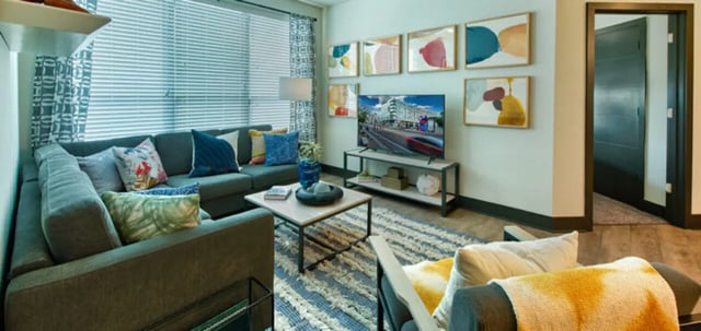 Sofa coffee table artwork modern television living room at Canvas in Tempe Student Accommodation