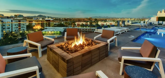 Fire pit lounge chairs pool exterior at Canvas in Tempe Student Accommodation