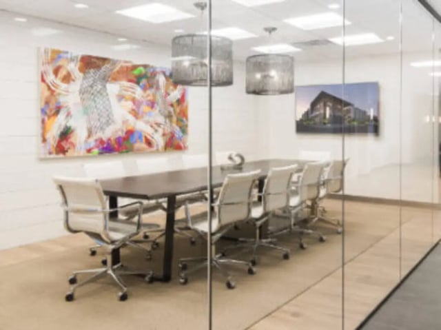 Conference table with chairs modern art artwork meeting room at UCity Flats in Philadelphia Student Accommodation