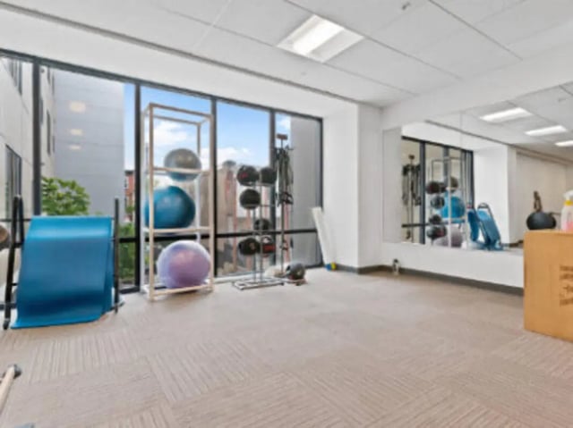 Yoga mat weight rack exercise balls fitness room at UCity Flats in Philadelphia Student Accommodation