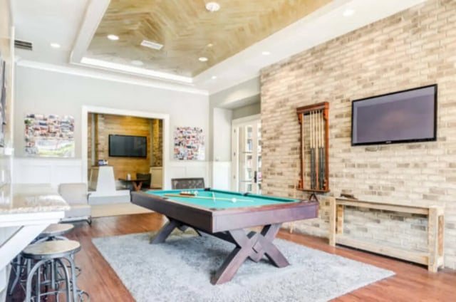 Pool table television and stools living room at Brexx at State College in State College Student Accommodation