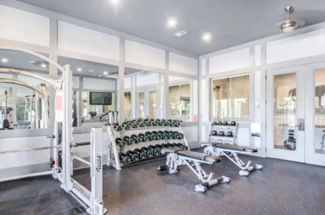 Dumbbell racks weight benches exercise machines gym room at Brexx at State College in State College Student Accommodation