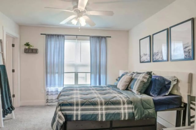 Bed with plaid bedding framed art window Bedroom at Brexx at State College in State College Student Accommodation