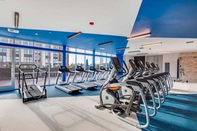 Treadmills and ellipticals gym room at The Crossings Apartments in Sacramento Student Accommodation