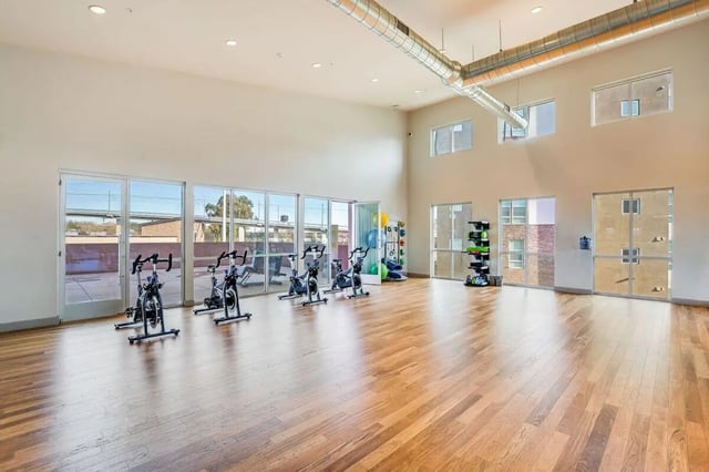 Spinning bikes large open room gym at The Crossings Apartments in Sacramento Student Accommodation