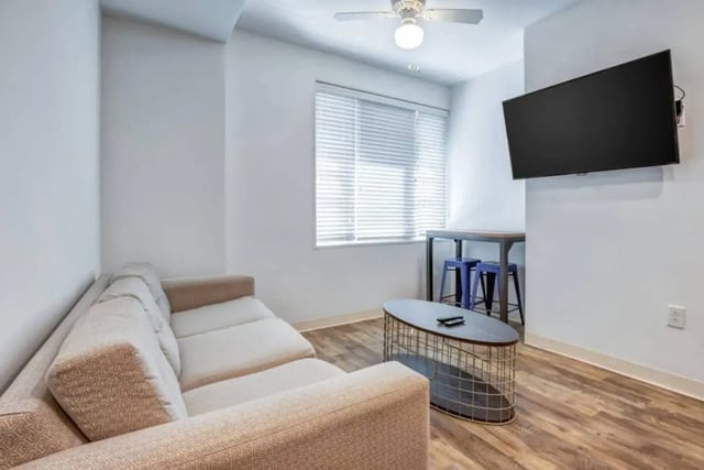 Sofa coffee table TV and stools living room at 61 Vandy in Charleston Student Accommodation