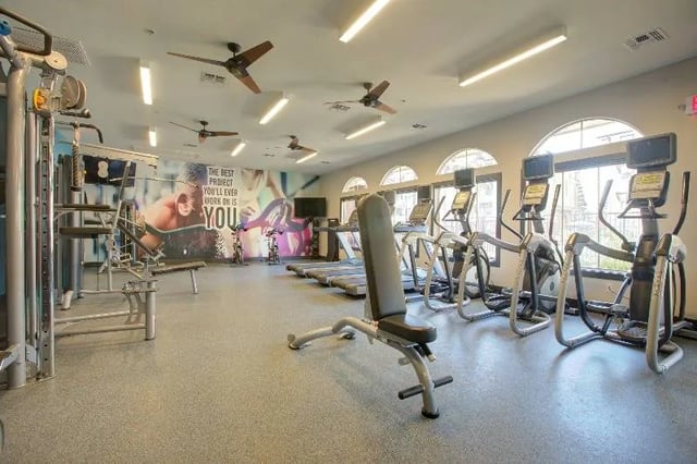 Gym with treadmills ellipticals weight bench gym Fitness Area at The U Apartments in Davis Student Accommodation