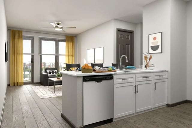 Kitchen island with dishwasher living room living area at Crimson in Tuscaloosa Student Accommodation