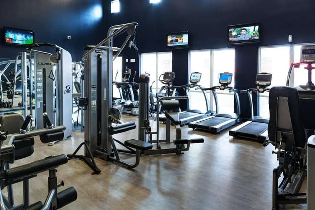 Gym equipment treadmills and weight machines gym at Crimson in Tuscaloosa Student Accommodation