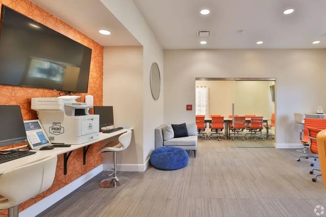 Computers printer seating meeting room at Clemson Edge in Clemson Student Accommodation
