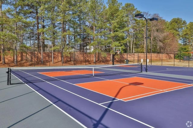 Tennis and basketball courts with nets exterior at Clemson Edge in Clemson Student Accommodation