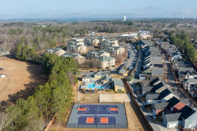 Apartment buildings pool and sports courts exterior at Clemson Edge in Clemson Student Accommodation