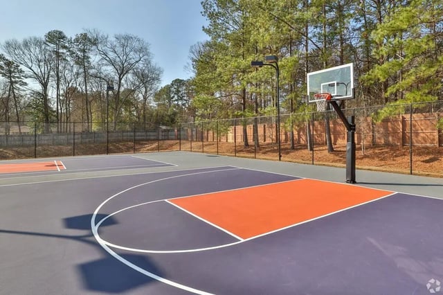 Basketball court with hoop and markings playing area at Clemson Edge in Clemson Student Accommodation