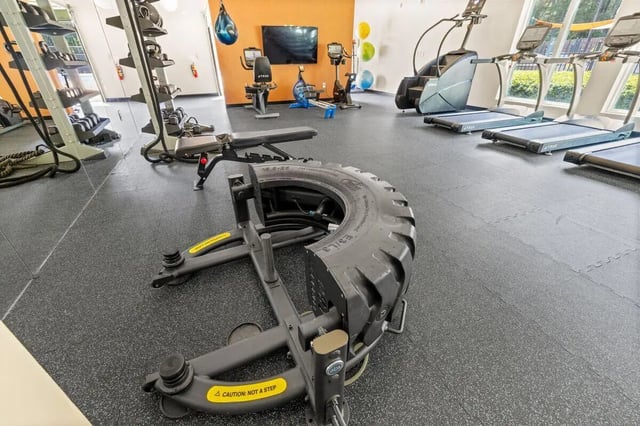 Tire exercise machine treadmills rowers gym equipment at Clemson Edge in Clemson Student Accommodation