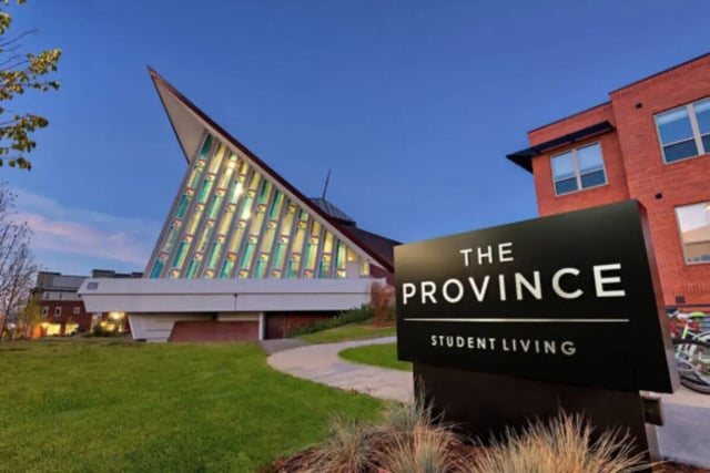 Sign building with stained glass exterior at The Province Boulder in Boulder Student Accommodation