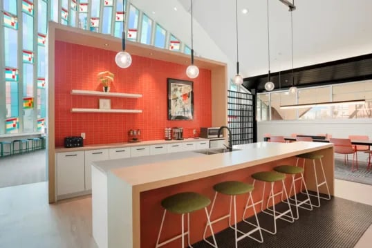 Island counter stools sink cabinets and toaster kitchen at The Province Boulder in Boulder Student Accommodation