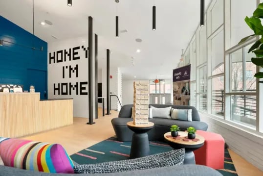 Reception area with lounge seating and game living room at The Province Boulder in Boulder Student Accommodation