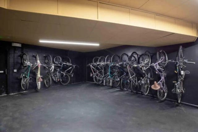 Bicycles racked on wall bicycle storage room at The Province Boulder in Boulder Student Accommodation