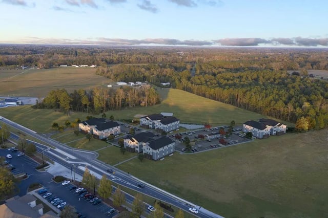 Apartment buildings with parking lots and green space exterior at 698 Prospect in Pembroke Student Accommodation