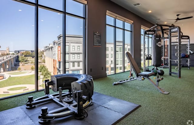 Tire sled workout bench punching bag gym equipment fitness area at The Davy in Knoxville Student Accommodation