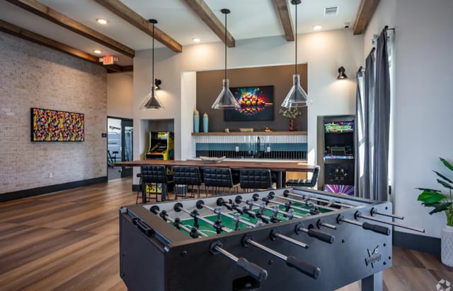 Foosball table arcade games communal lounge living room at The Davy in Knoxville Student Accommodation