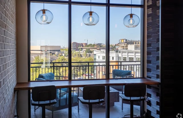 Bar stools and window view communal area at The Davy in Knoxville Student Accommodation