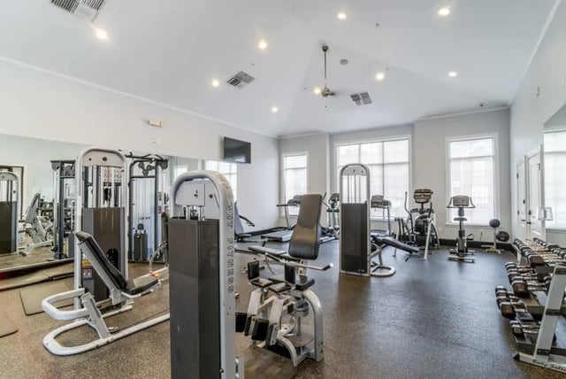 Weight machines treadmills dumbbells gym area. at The Province Greensboro in Greensboro Student Accommodation