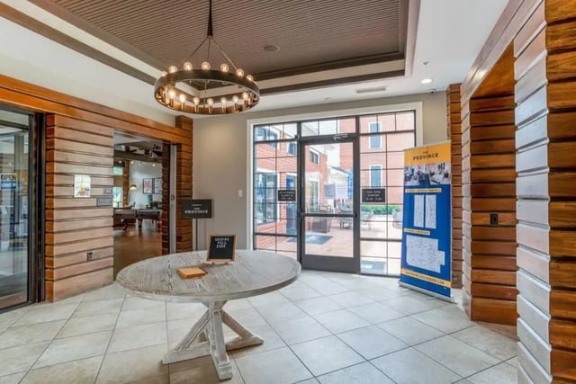 Round table leasing sign open space interior at The Province Greensboro in Greensboro Student Accommodation