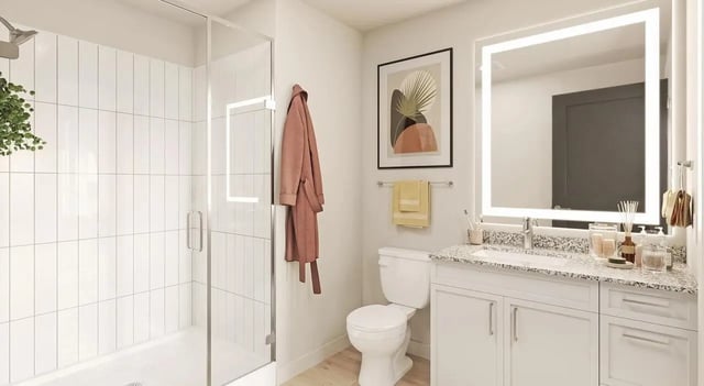 Shower toilet vanity with sink and mirror bathroom at Aspire Reserve in College Station Student Accommodation