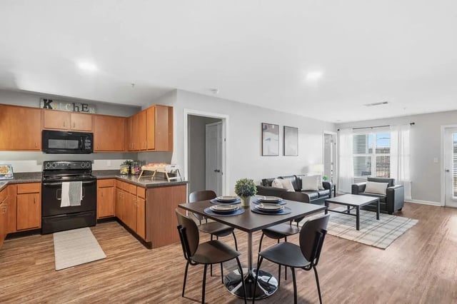 Kitchen dining area and living room at Altitude Baton Rouge | Apartment Complex in Baton Rouge Student Accommodation