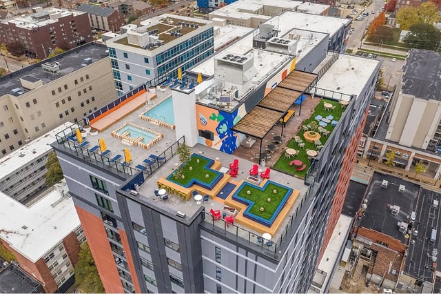 Rooftop pool hot tubs seating areas exterior at The Dean Campustown in Champaign Student Accommodation