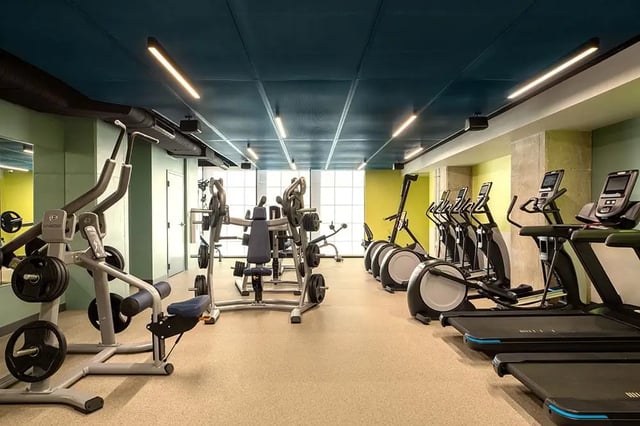 Weight machines treadmills and ellipticals gym at The Dean Campustown in Champaign Student Accommodation