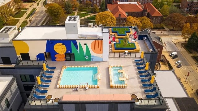 Pool hot tub miniature golf area exterior at The Dean Campustown in Champaign Student Accommodation