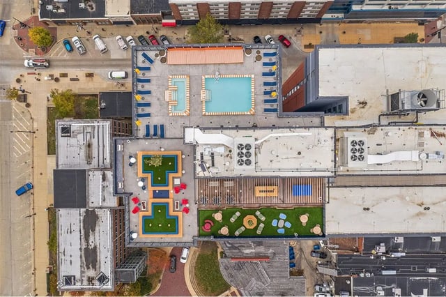 Rooftop pool lounge areas and green spaces Exterior at The Dean Campustown in Champaign Student Accommodation
