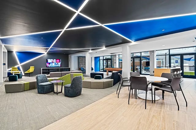 Lounge with tv pool table seating and tables communal area at Bixby Kennesaw in Kennesaw Student Accommodation