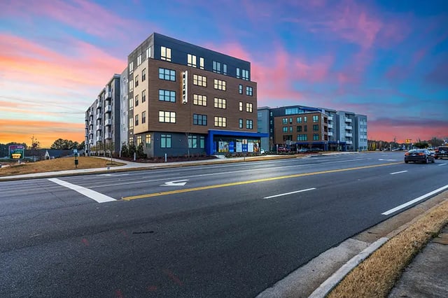 Apartment building with windows and balconies exterior at Bixby Kennesaw in Kennesaw Student Accommodation