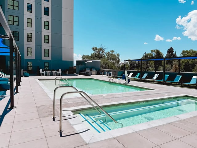 Pool with loungers and grills exterior at The Dean Reno in Reno Student Accommodation