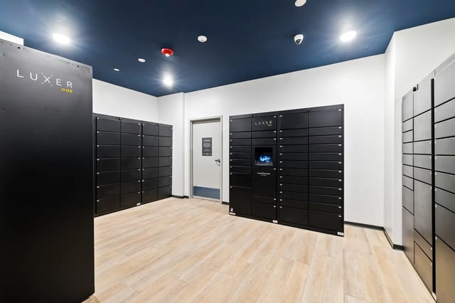 Luxer One package lockers and door interior at The Dean Reno in Reno Student Accommodation
