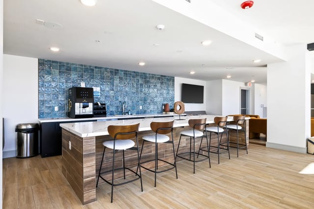 Coffee machine counter with bar stools kitchen at The Dean Reno in Reno Student Accommodation