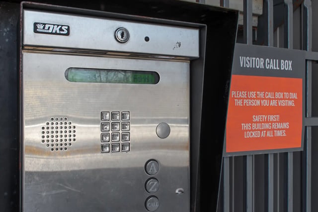 Visitor call box with keypad and display exterior at The Q'ube in Springfield Student Accommodation